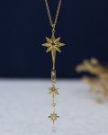 gold space star necklace