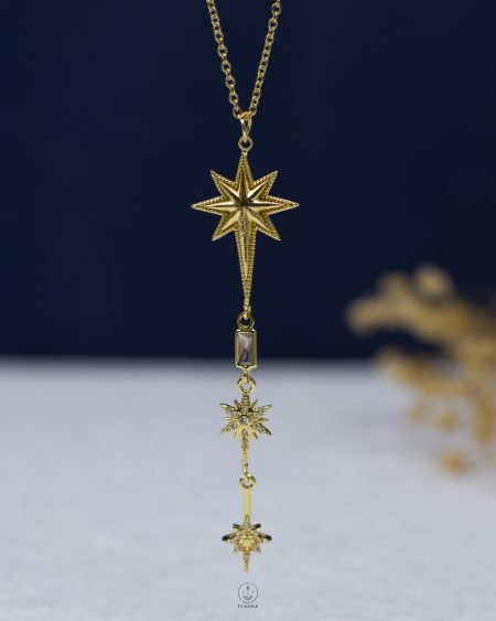 gold space star necklace