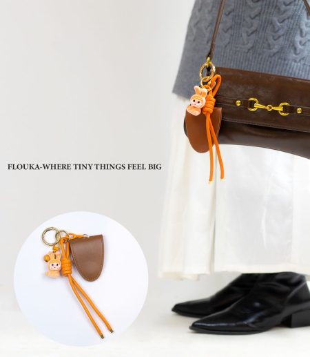 orang cry baby glass holder keychain