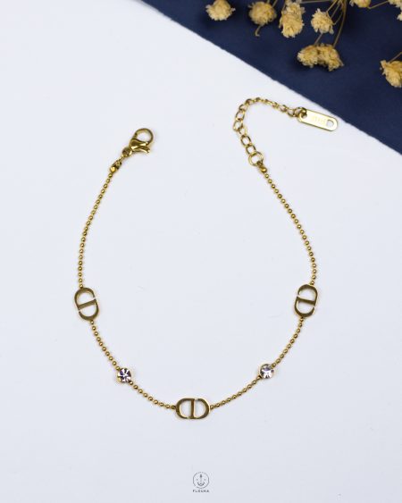 tiny struas gold CD bracelet