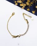 white tennis gold YSL bracelet