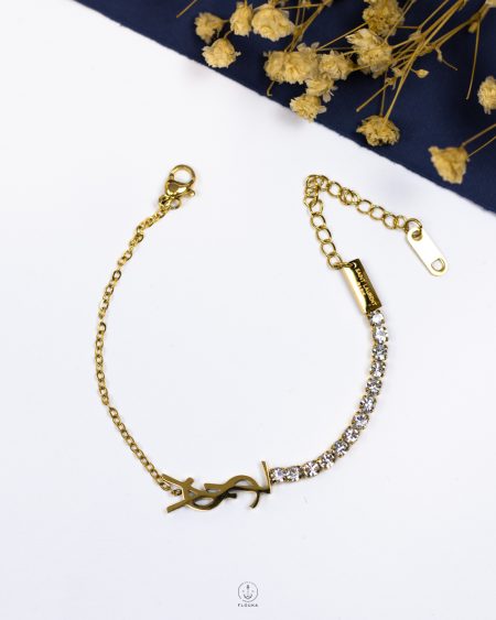 white tennis gold YSL bracelet