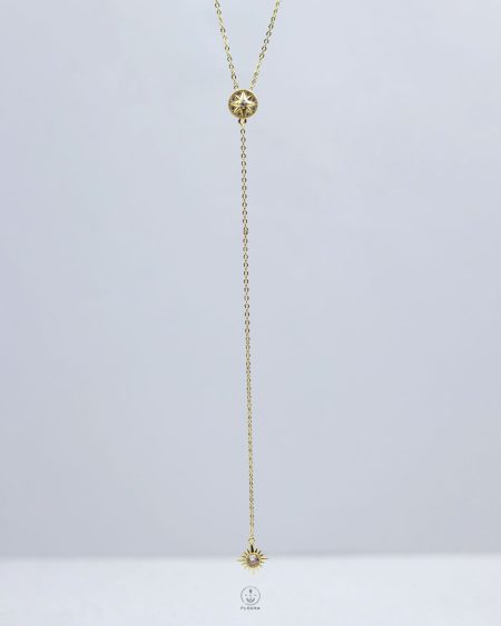 gold space star drop necklace