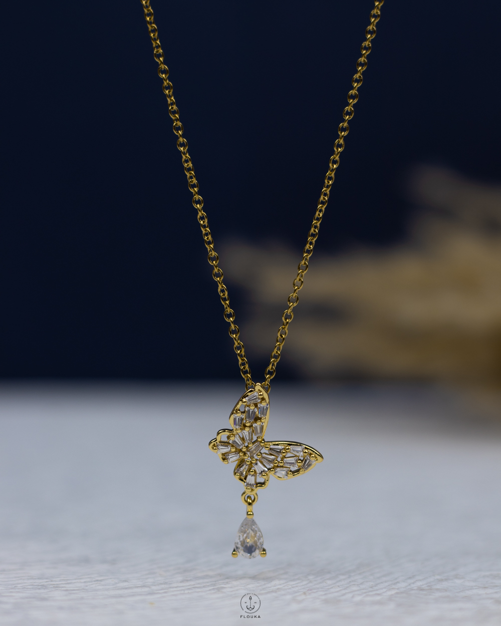 1765739625_n2125.jpg white straus crystal butterfly gold necklace