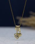 straus gold eye heart necklace