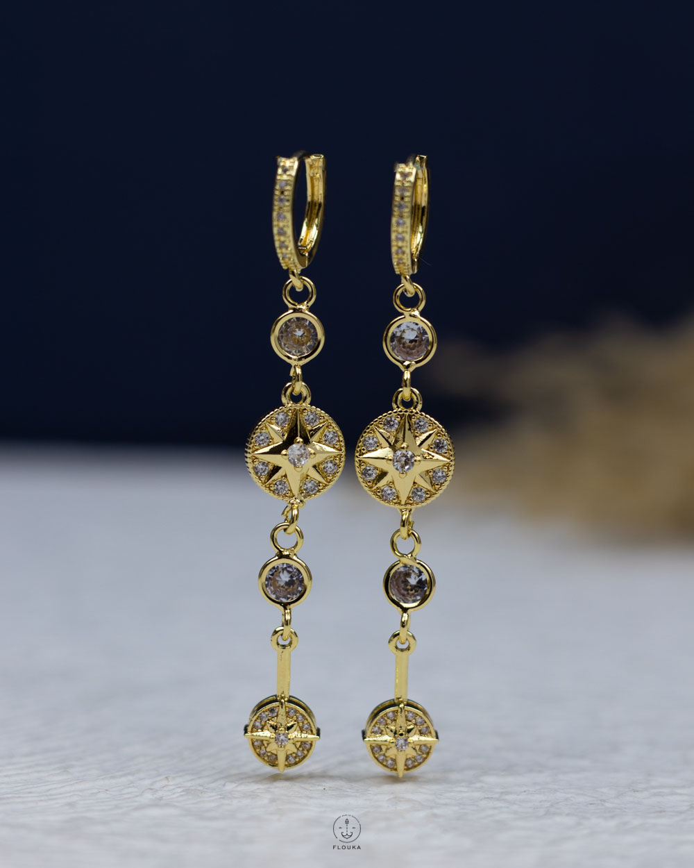 1766000311_e0932.jpg gold space star earring