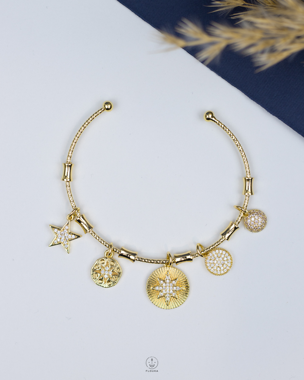 1766003385_o1123.jpg white straus space star gold bracelet